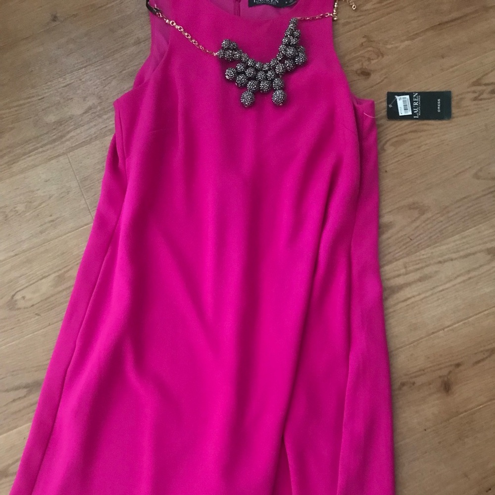 Versatile sleeveless cocktail/ work dress